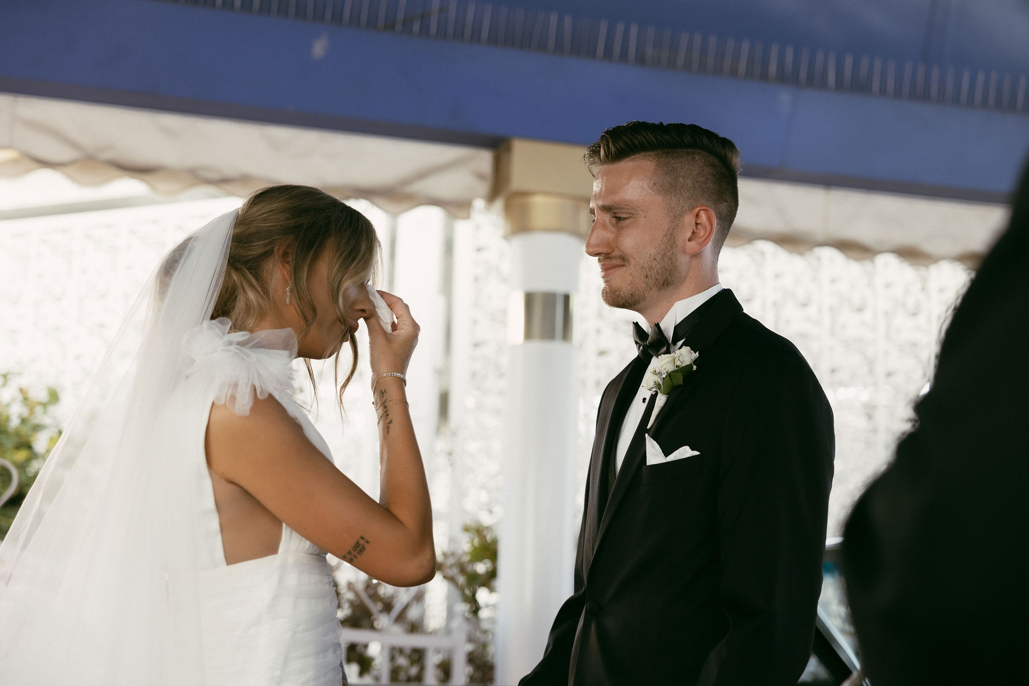 An intimate wedding  Pink Cadillac wedding ceremony at The Little White Chapel