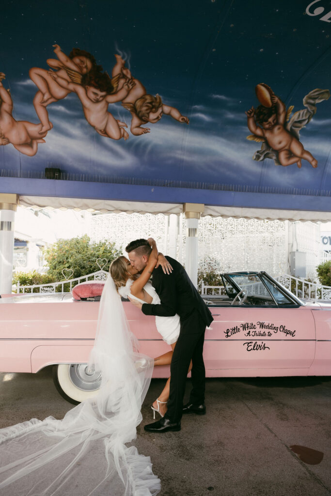 An intimate wedding  Pink Cadillac wedding ceremony at The Little White Chapel