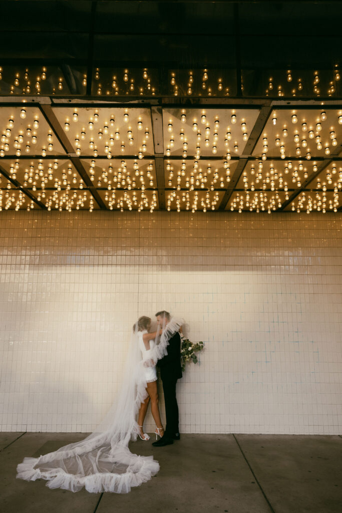 Bride and groom portraits on Fremont Street after their Las Vegas elopement