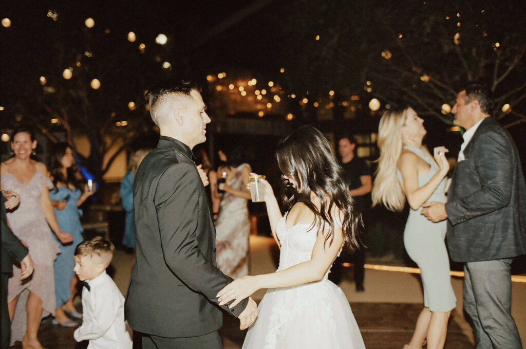 Bride and groom dancing on 35mm film