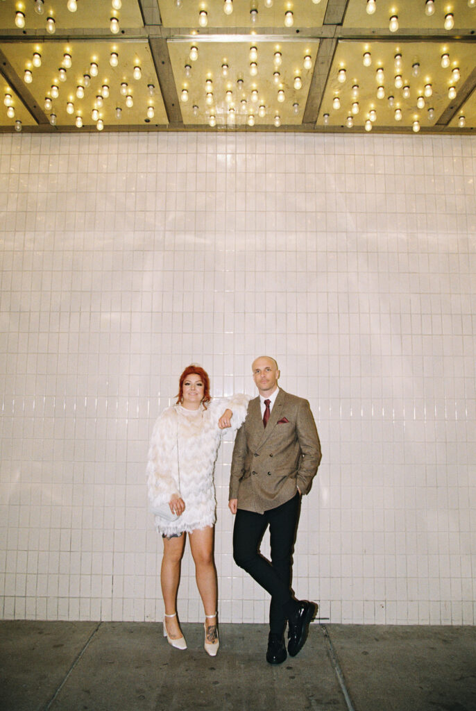 Bride and groom portraits on Fremont Street in Vegas captured on 35mm film