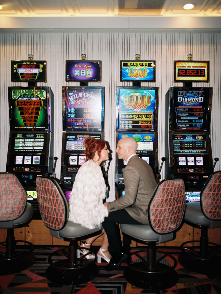 Bride and grooms portraits in the casino on Fremont Street