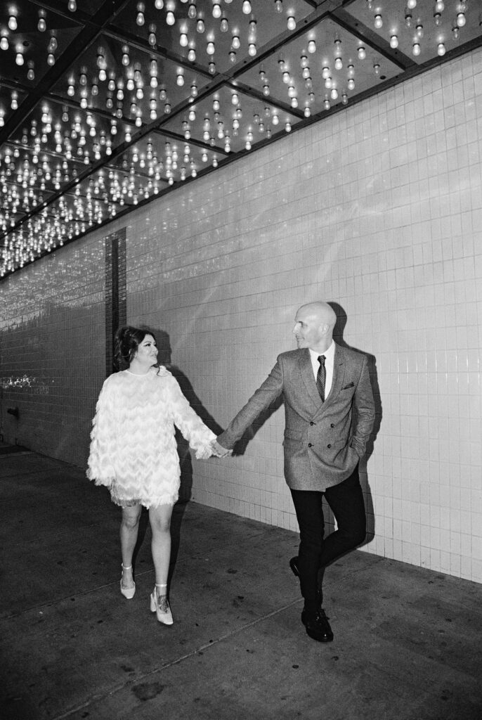 Bride and groom portraits on Fremont Street in Vegas captured on 35mm film