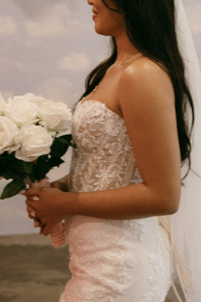 Close up shot of a bride with her bouquet at Sure Thing Chapel