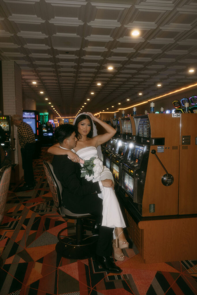 Bride and groom photos at a casino on Fremont Street