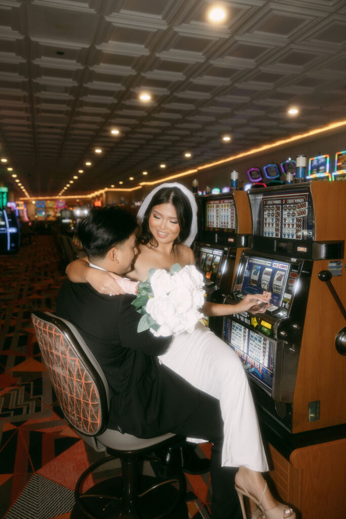 Bride and groom photos at a casino on Fremont Street