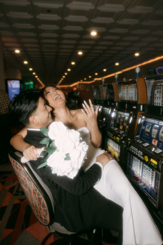 Bride and groom photos at a casino on Fremont Street