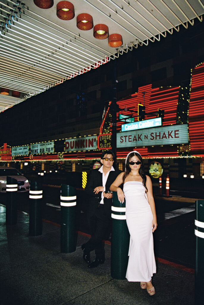 Film photos of a bride and groom at Steak and Shake