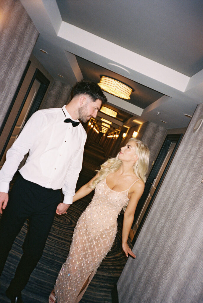 Bride and grooms night before elopement photoshoot at Bellagio in Las Vegas captured on 35mm film