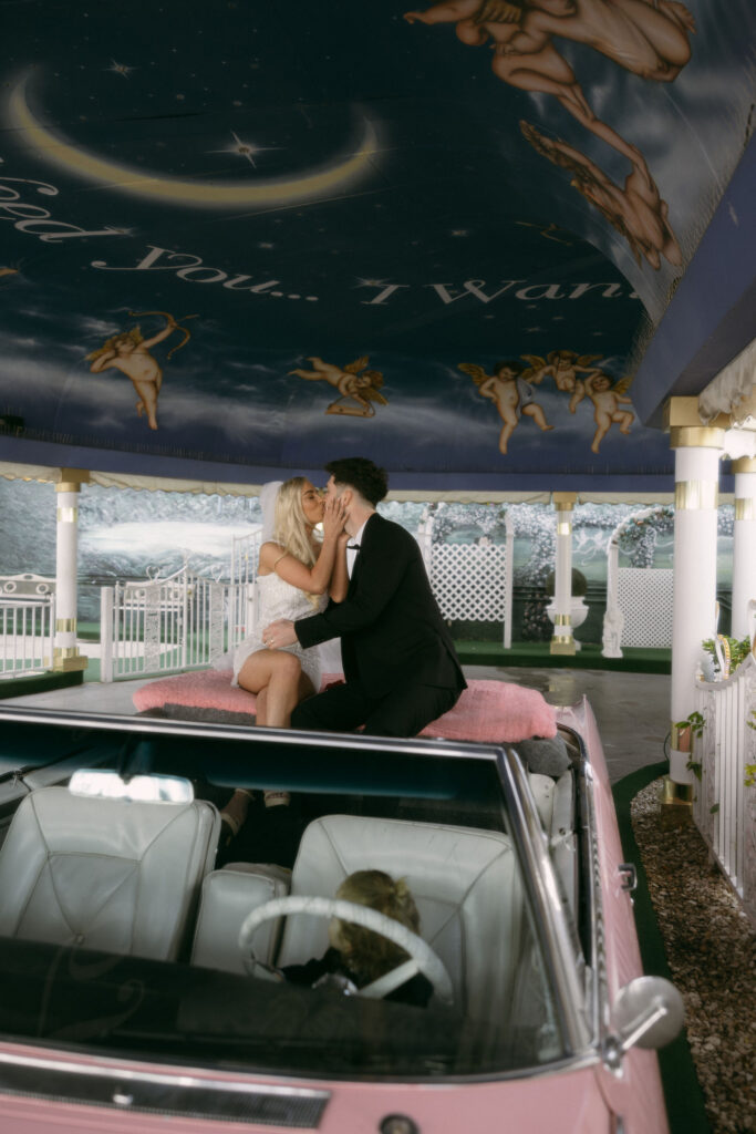 Bride and grooms intimate Little White Chapel Pink Cadillac ceremony