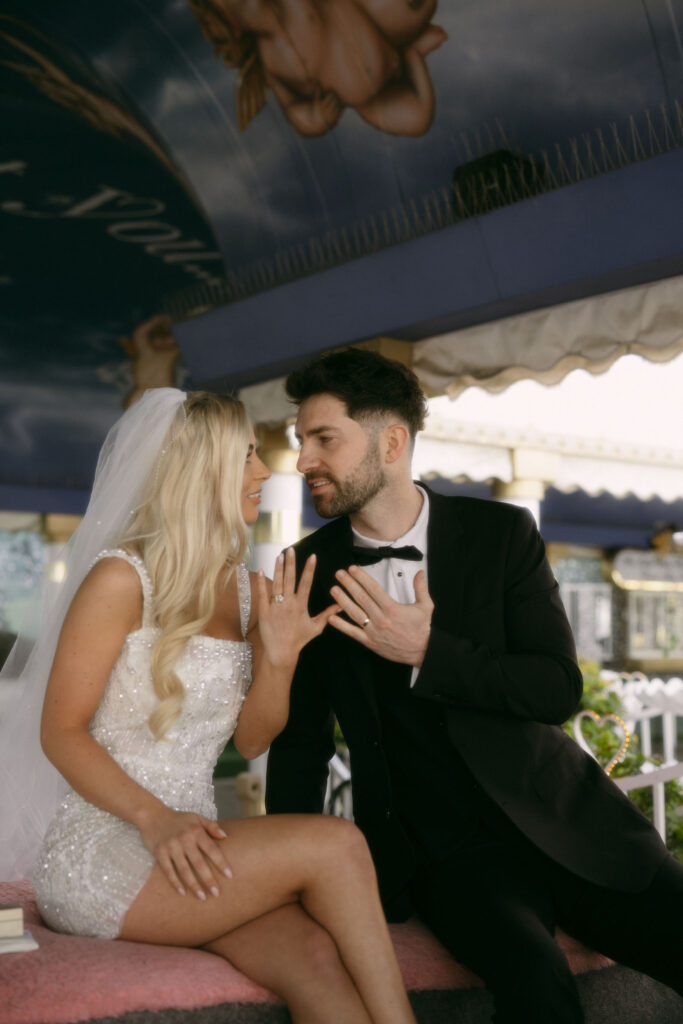 Bride and grooms intimate Little White Chapel Pink Cadillac ceremony