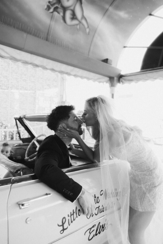 Bride and grooms intimate Little White Chapel Pink Cadillac ceremony