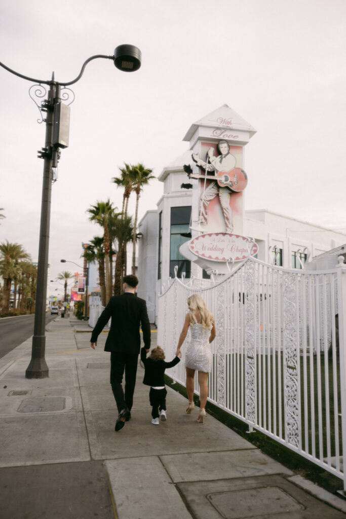 Bride and groom portraits at The Little White Chapel with their toddler son