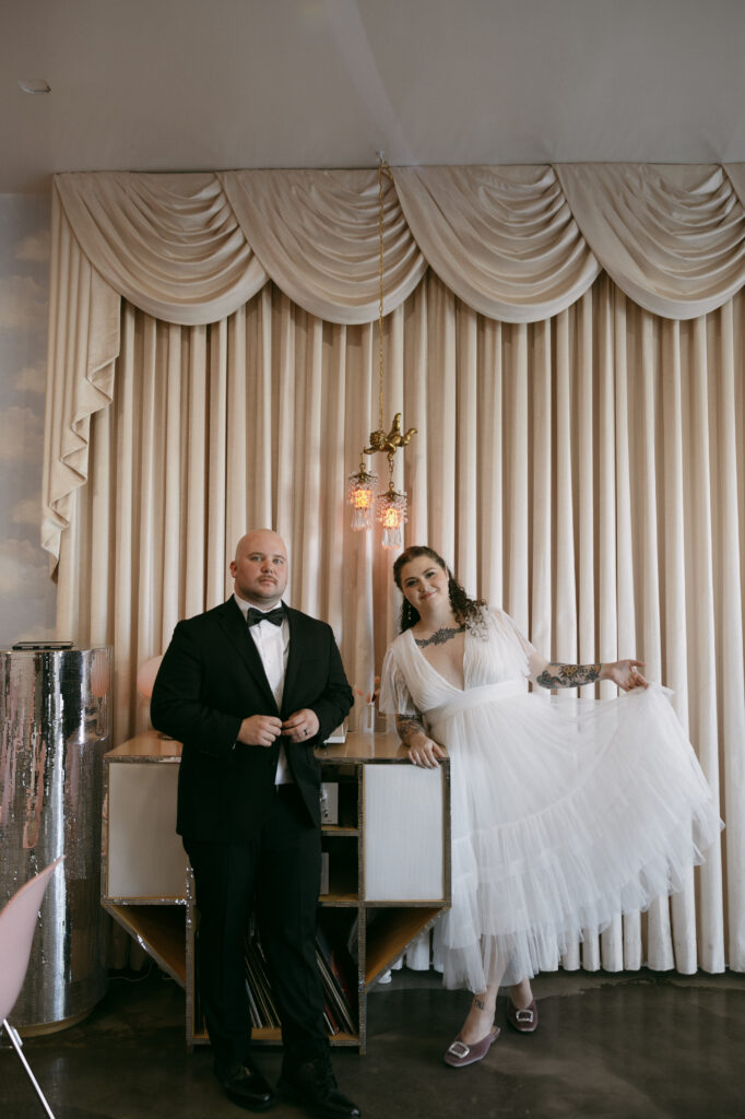 Bride and groom posing at Sure Thing Chapel in Las Vegas