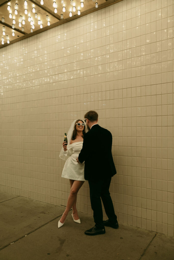 Bride and groom night elopement photos on Fremont Street in Vegas