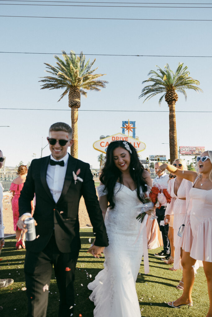 Bride and grooms photos in front of the Las Vegas sign