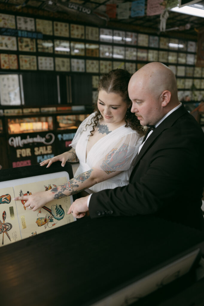 Bride and groom checking out a store