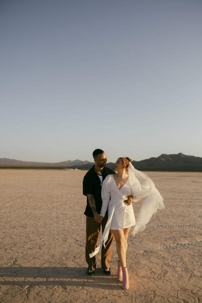 Bride and grooms sunset Dry Lake Bed Las Vegas wedding portraits