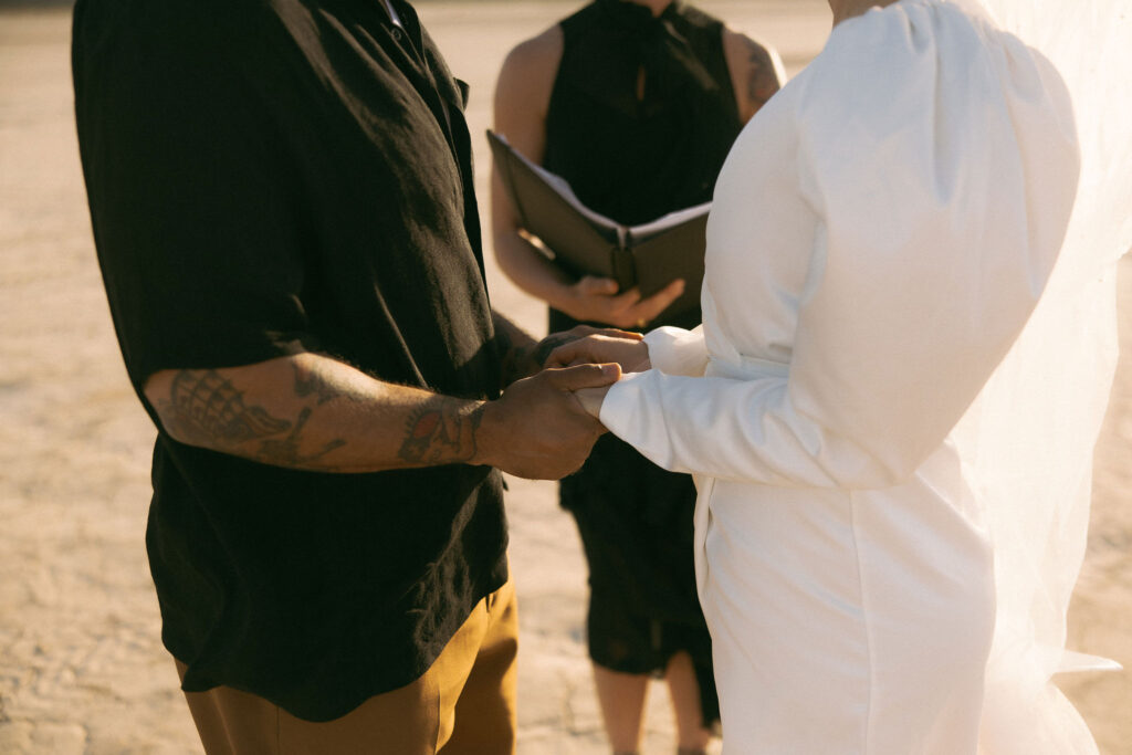 An intimate Dry Lake Bed Las Vegas wedding ceremony officiated by Peachy Keen Unions