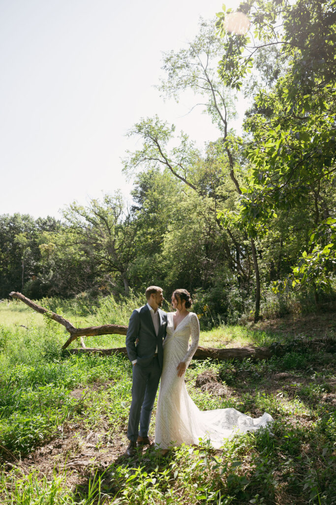 Bride and grooms outdoor wedding portraits from their summer camp wedding at Camp Kettlewood in Wisconsin