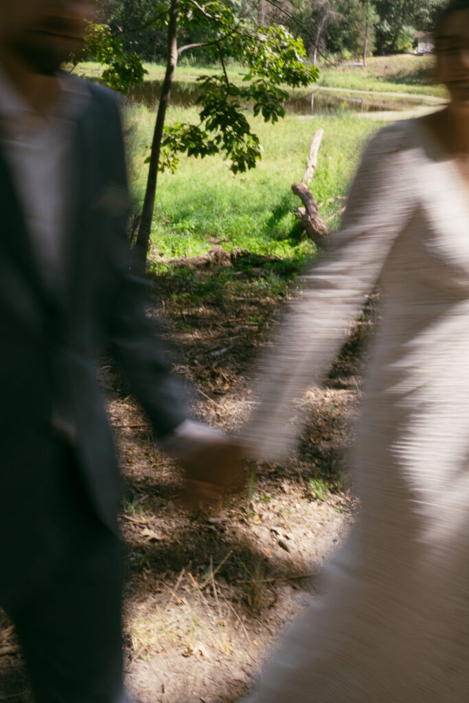 Blurry photo of a bride and groom from their Wisconsin summer camp wedding