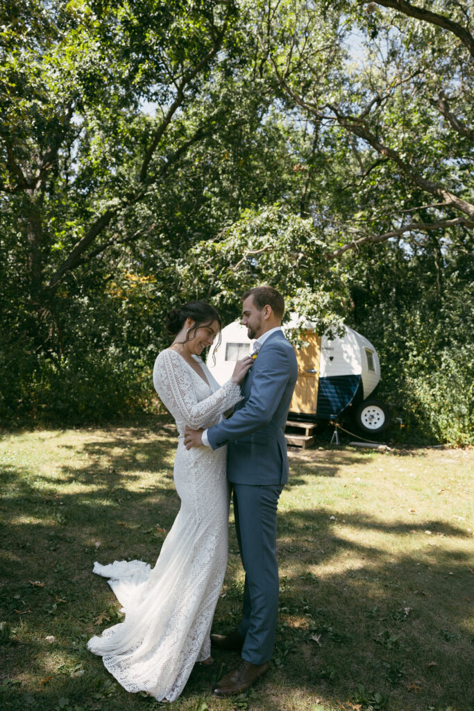 Outdoor bride and grooms portraits from a summer camp wedding in Wisconsin at Camp Kettlewood