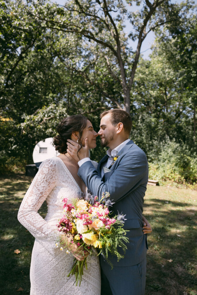 Outdoor bride and grooms portraits from a summer camp wedding in Wisconsin at Camp Kettlewood