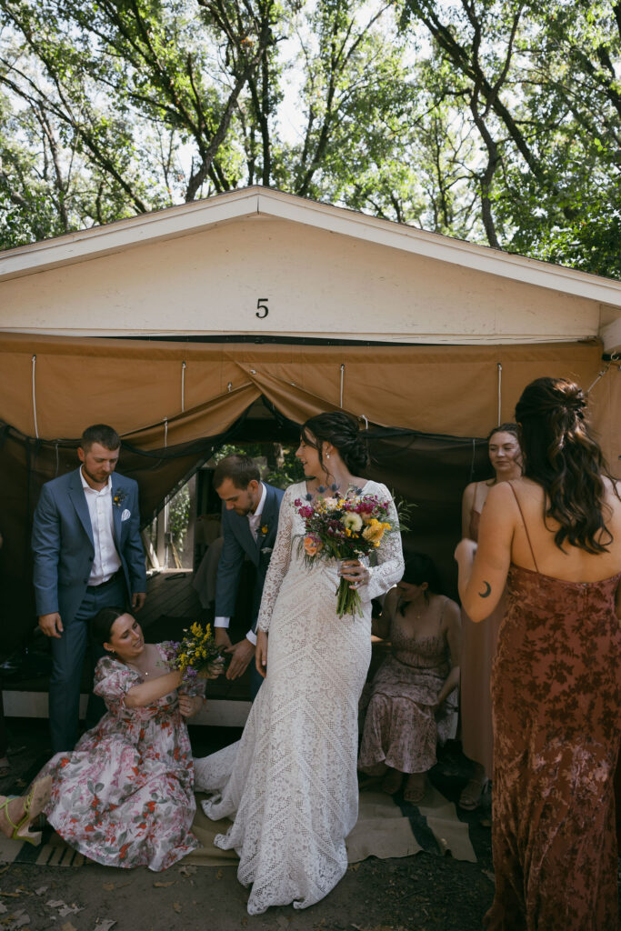 Candid wedding party portraits from a summer camp wedding in Wisconsin at Camp Kettlewood