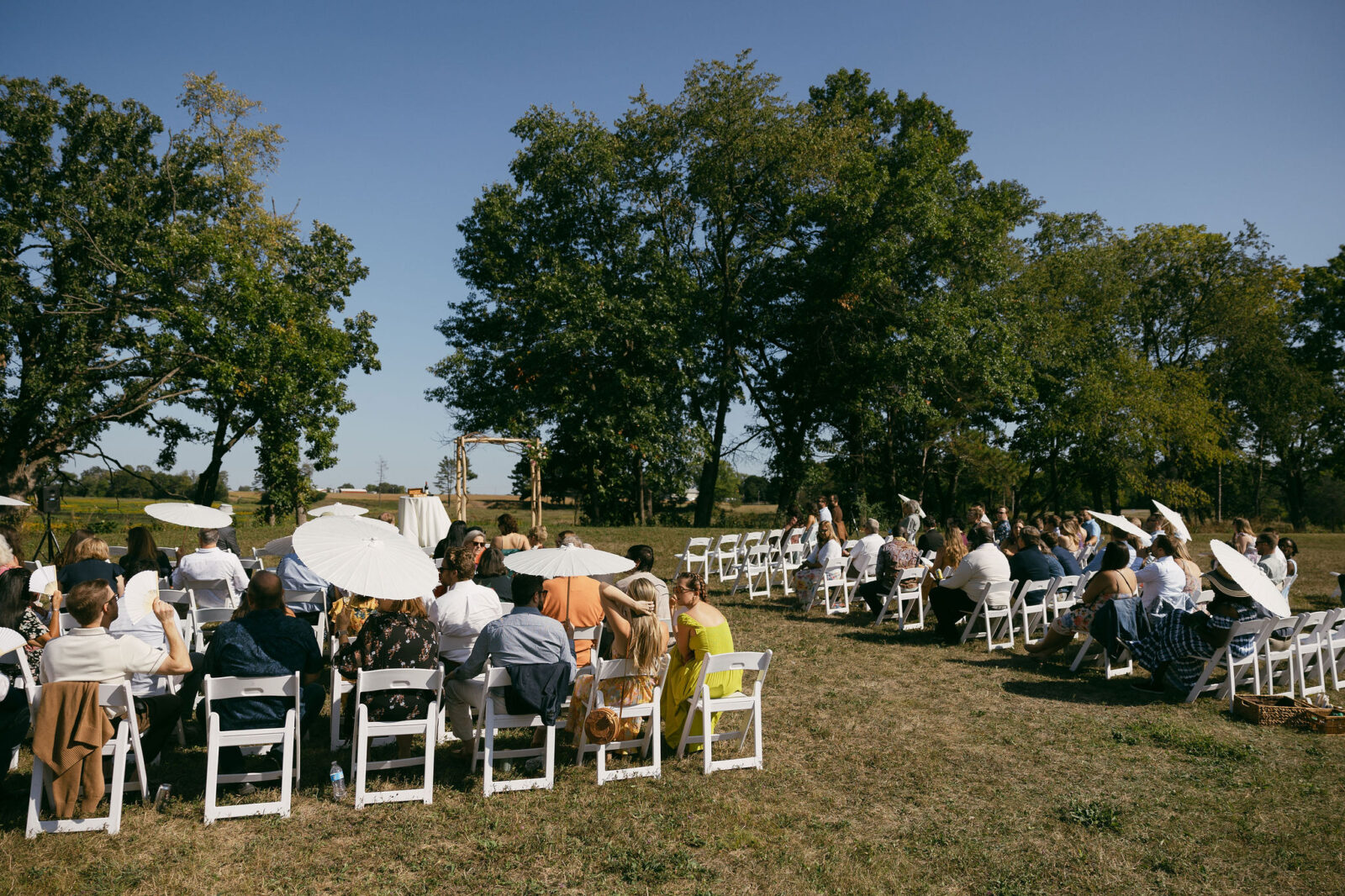 An outdoor summer camp wedding ceremony at Camp Kettlewood in East Troy, Wisconsin - just outside of Milwaukee