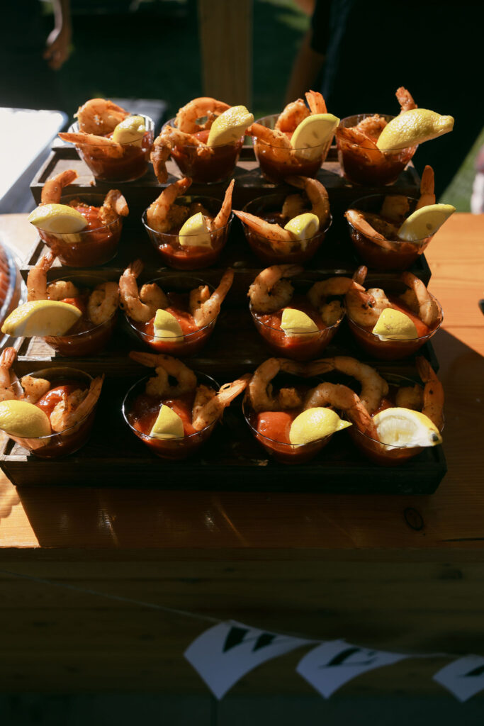 Shrimp in cocktail sauce with lemon slices for a summer camp wedding in Wisconsin