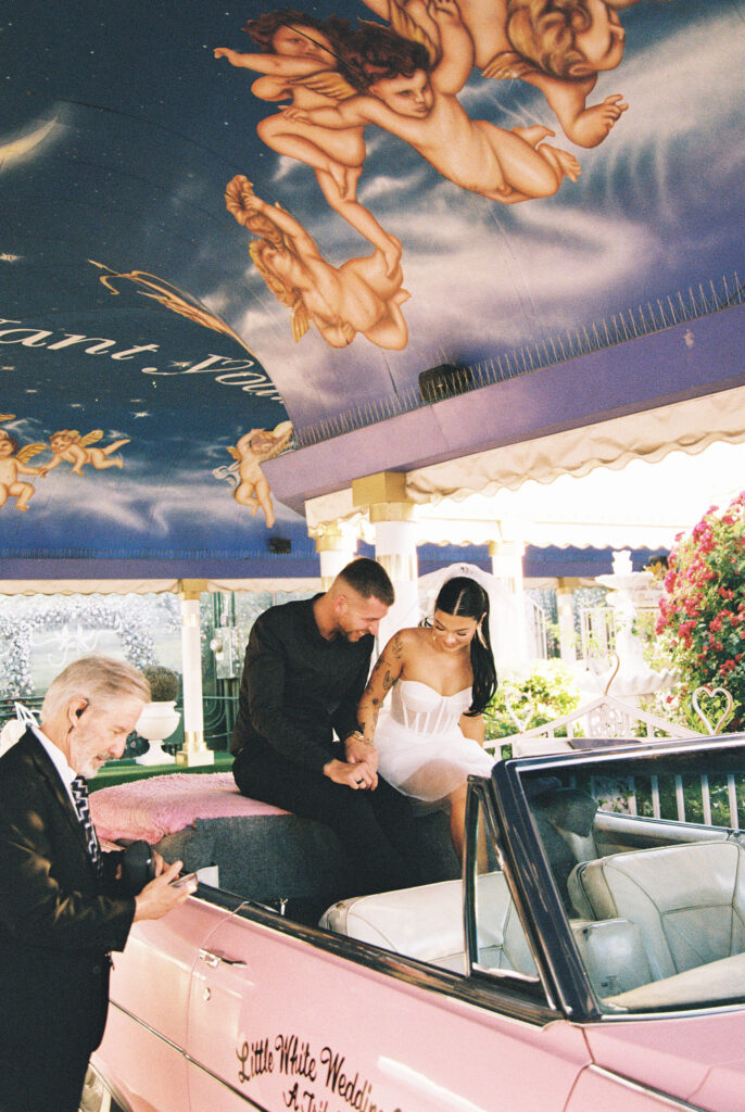 Bride and grooms Pink Cadillac ceremony captured on film