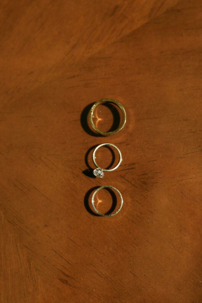 Wedding rings and band detail shot