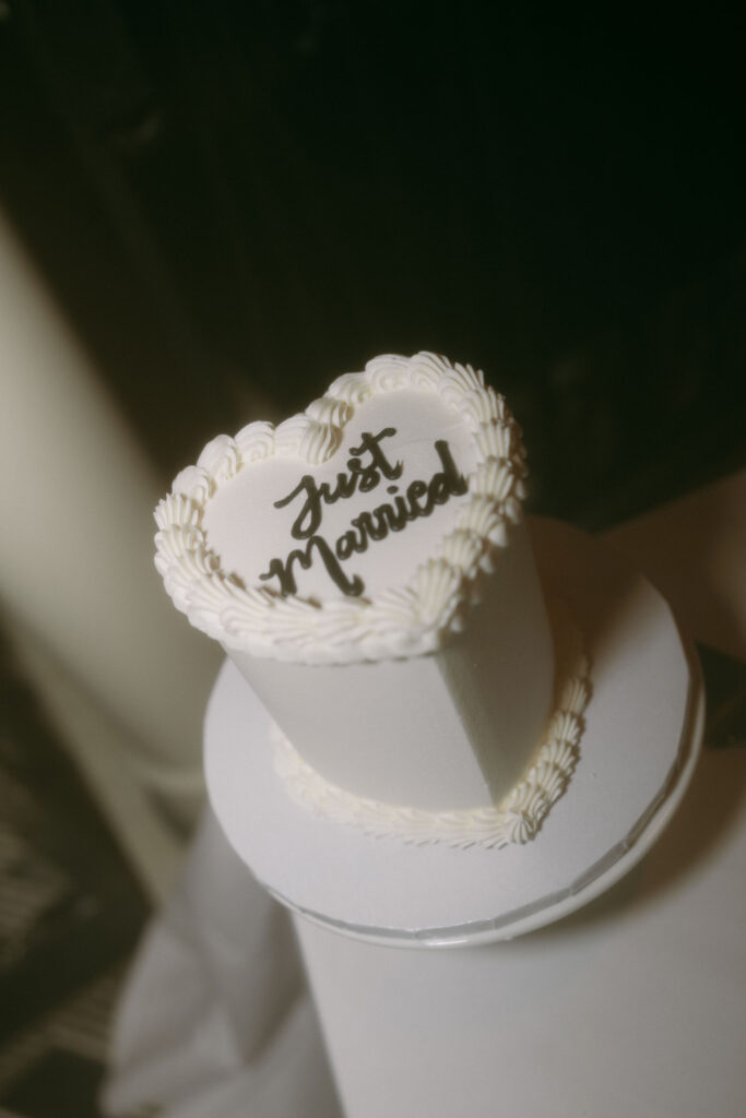 Small heart shaped cake that says just married