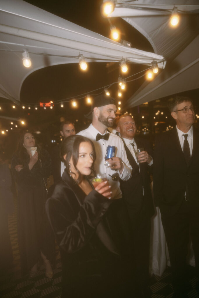 Bride and groom mingling during their Venetian wedding reception at Black Tap