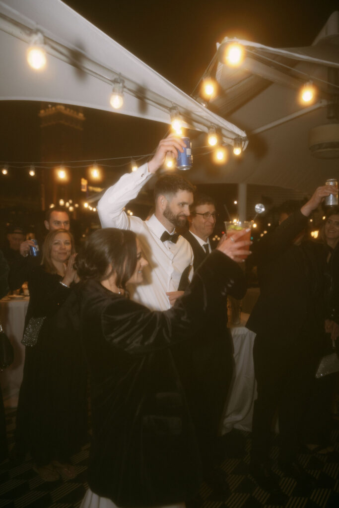 Bride and groom mingling during their Venetian wedding reception at Black Tap