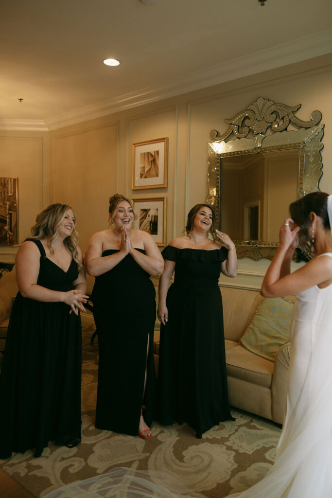 Brides first look with her bridesmaids