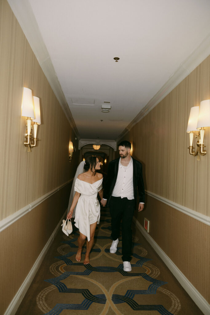 Bride and grooms Venetian wedding portraits in the hallway