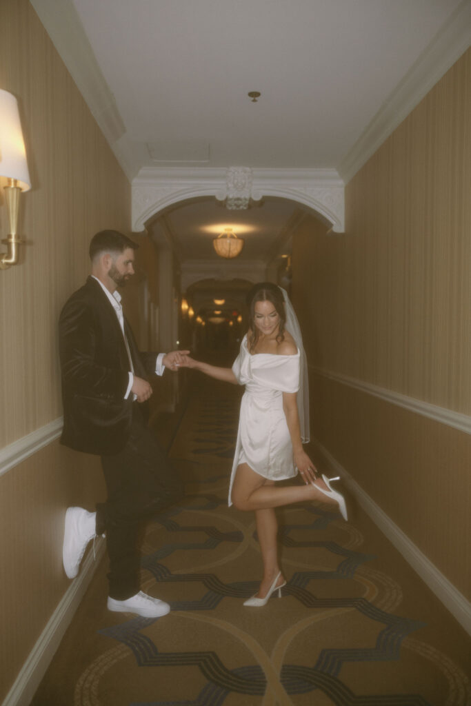 Bride and grooms Venetian wedding portraits in the hallway