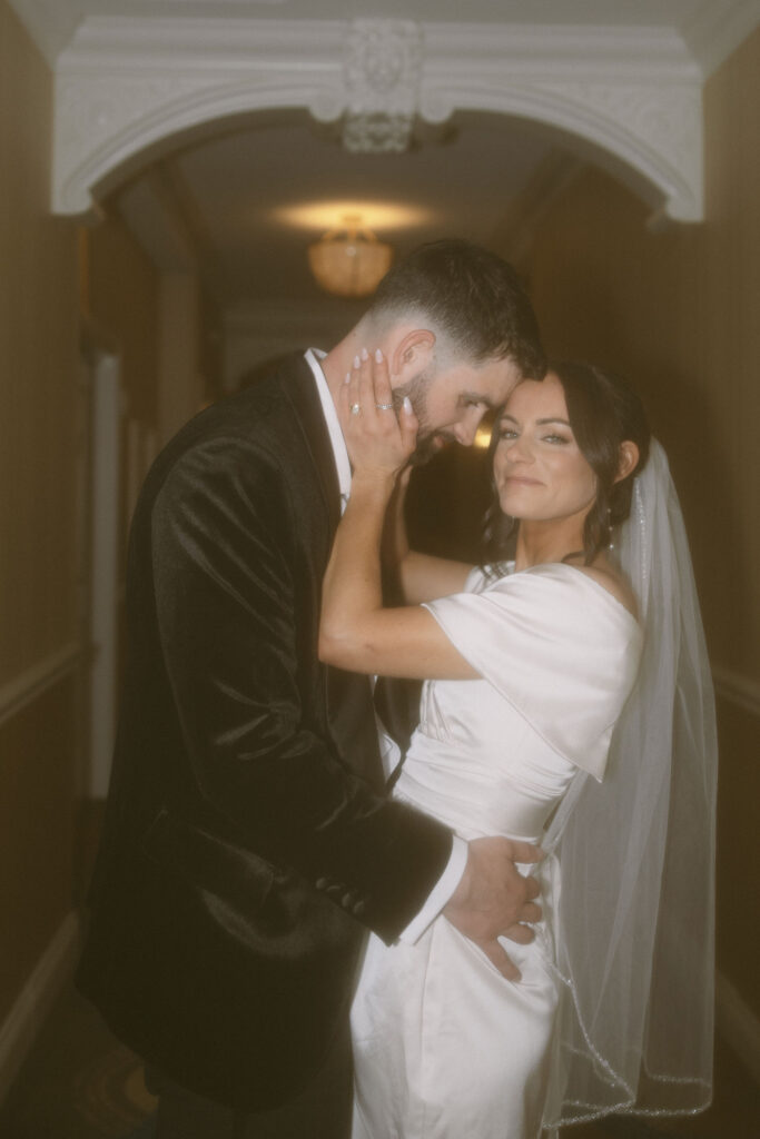 Bride and grooms Venetian wedding portraits in the hallway