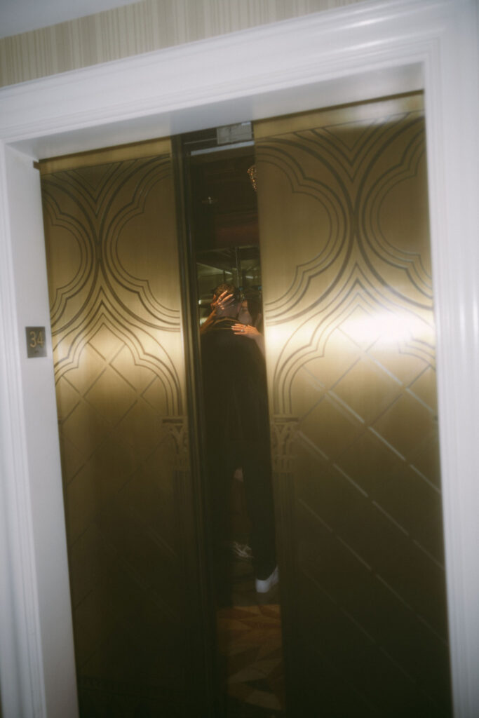 Bride and grooms Venetian wedding portraits in the elevator