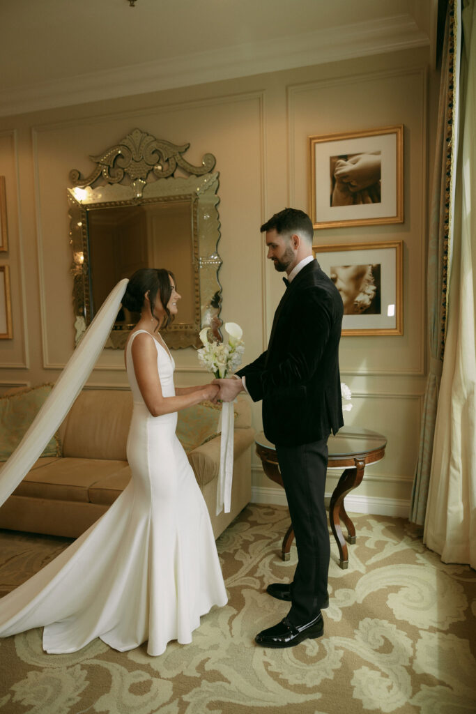 Bride and groom sharing an emotional first look