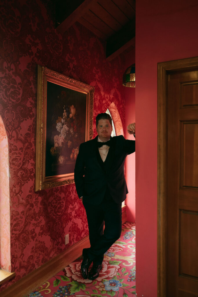 Indoor grooms portraits at Madonna Inn wedding venue in California