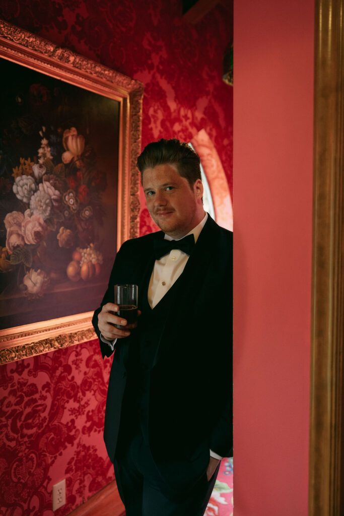 Indoor grooms portraits at Madonna Inn wedding venue in California