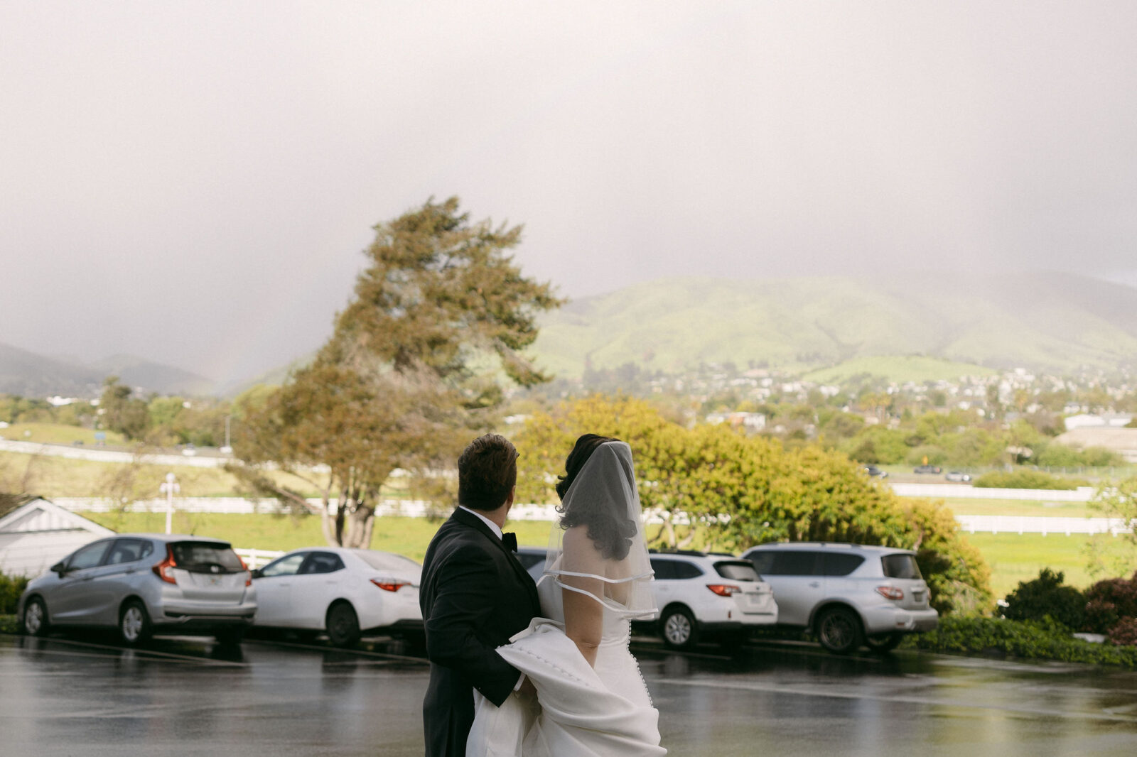 Bride and groom taking in the views from Madonna Inn in California