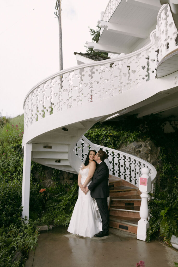 Bride and grooms outdoor portraits outside of Madonna Inn in California