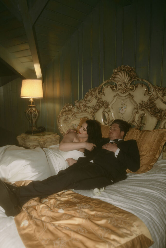 Bride and grooms sexy post wedding photos in their hotel room