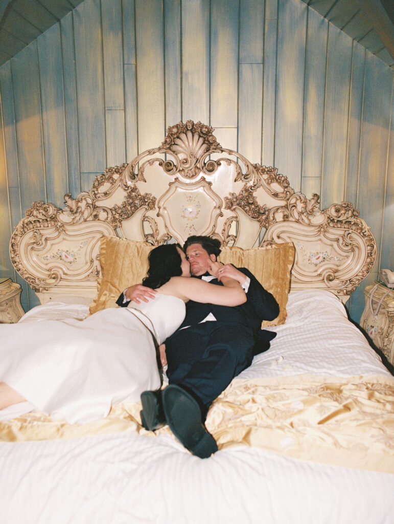 Bride and grooms sexy post wedding portraits at Madonna Inn wedding venue captured on film