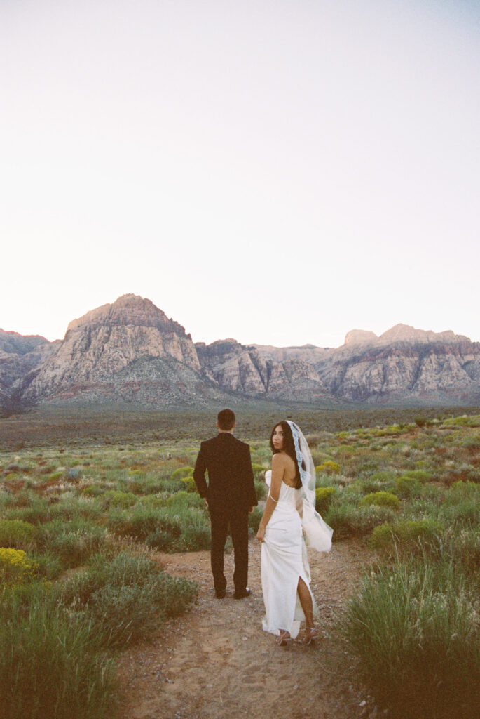 Film photo of a bride and groom in Red Rock Canyon - digital vs film wedding photography