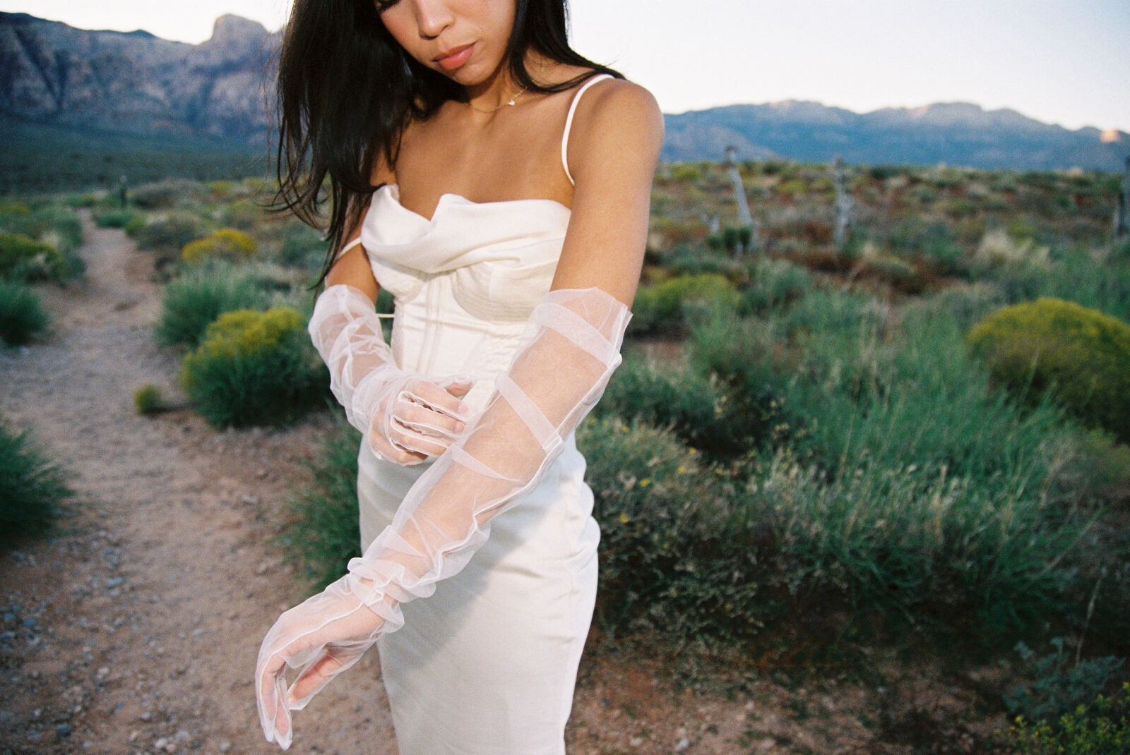 Film photo of a bride in Red Rock Canyon - digital vs film wedding photography