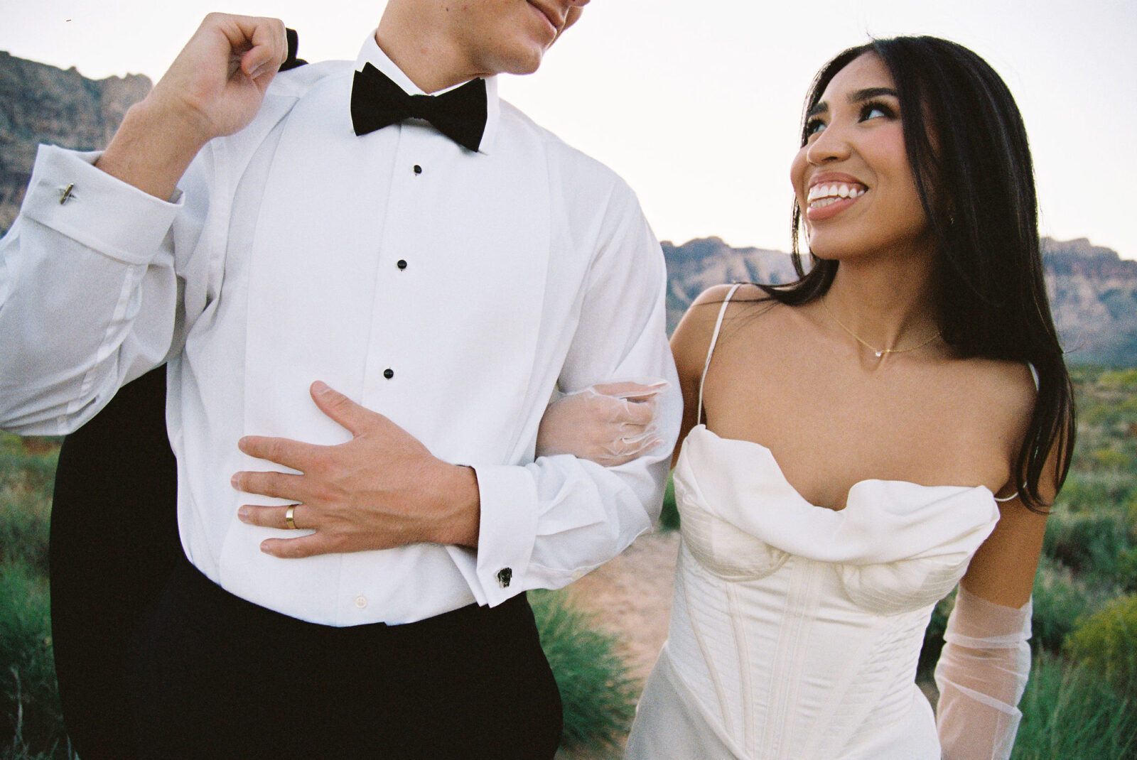 Film photo of a bride and groom in Red Rock Canyon - digital vs film wedding photography